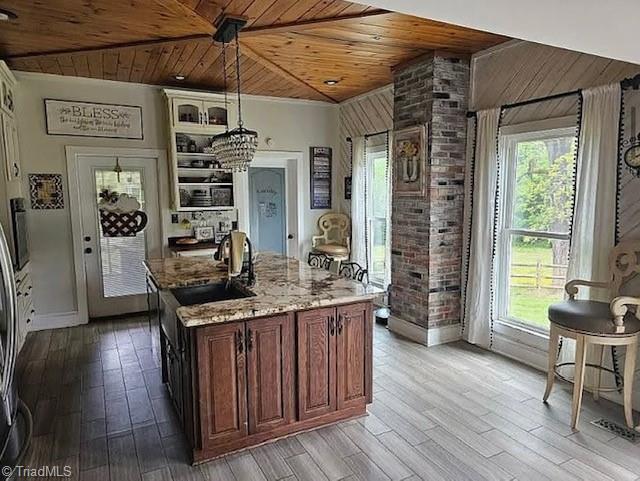 1715 Alfred Hartley Rd, Lenoir, NC 28645 - kitchen featuring wooden ceiling, a sink, plenty of natural light, light stone counters, and light wood-type flooring