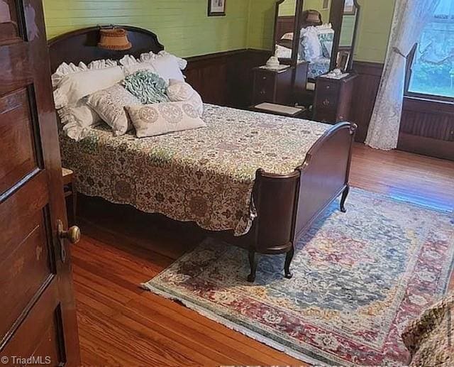 1715 Alfred Hartley Rd, Lenoir, NC 28645 - bedroom with wood finished floors and wainscoting