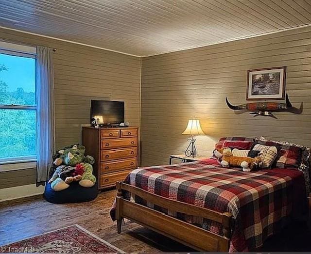 1715 Alfred Hartley Rd, Lenoir, NC 28645 - bedroom with wood finished floors