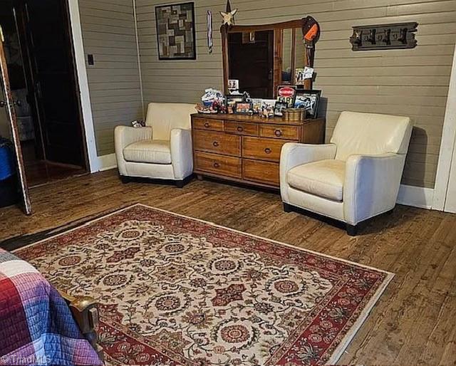 1715 Alfred Hartley Rd, Lenoir, NC 28645 - living area with wood finished floors, wood walls, and baseboards