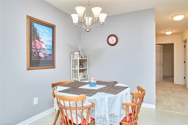 4712 Brighton Park Dr Unit 1B, Winston-Salem, NC 27103 - dining room with a chandelier, baseboards, and light carpet