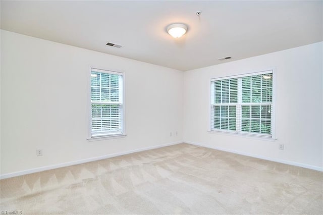 4712 Brighton Park Dr Unit 1B, Winston-Salem, NC 27103 - carpeted spare room featuring baseboards and a pendent fire sprinkler