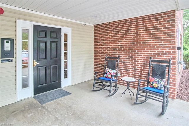 4712 Brighton Park Dr Unit 1B, Winston-Salem, NC 27103 - doorway to property with brick siding