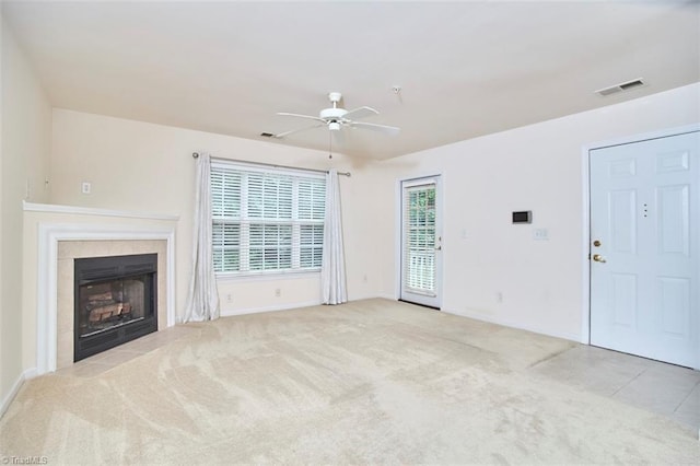 4712 Brighton Park Dr Unit 1B, Winston-Salem, NC 27103 - unfurnished living room with a ceiling fan, baseboards, a fireplace, and carpet floors