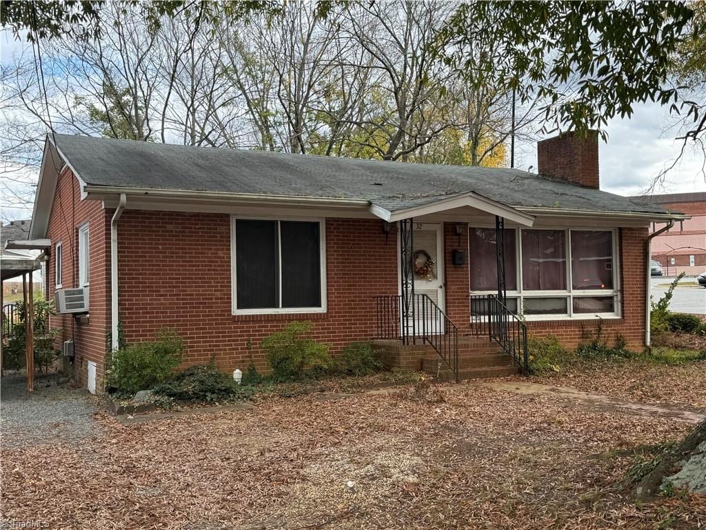 view of front of house with cooling unit