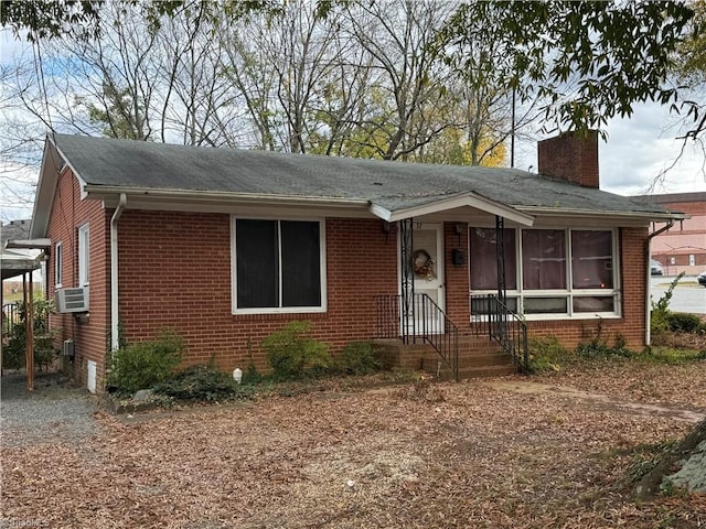 view of front of house with cooling unit