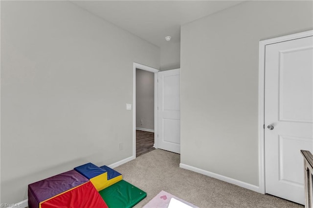 unfurnished bedroom featuring light colored carpet