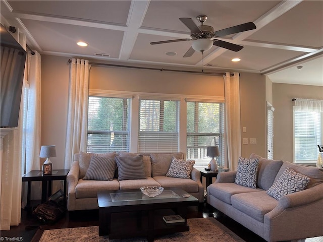 living room featuring hardwood / wood-style floors, ceiling fan, coffered ceiling, and beam ceiling