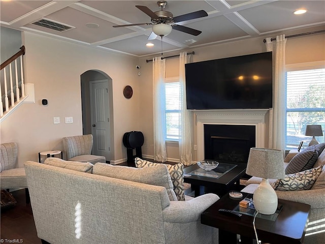 living room with ceiling fan, a healthy amount of sunlight, coffered ceiling, and hardwood / wood-style flooring