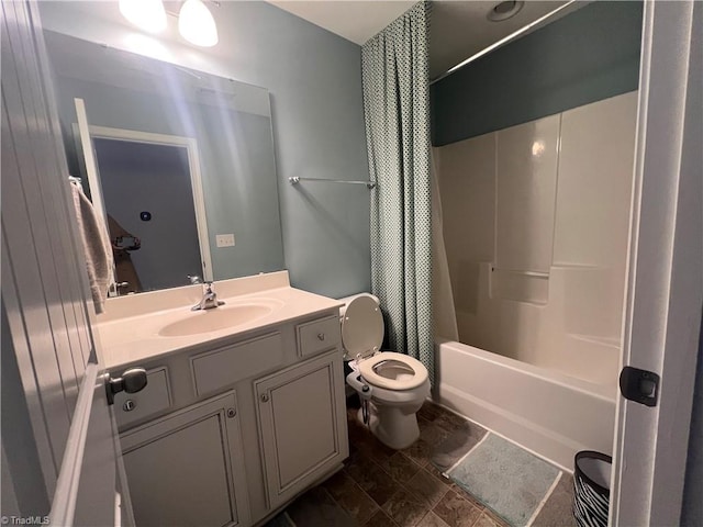 full bathroom with vanity, toilet, and shower / tub combo with curtain