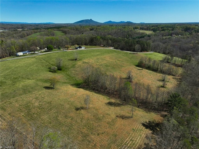 aerial view featuring a mountain view and a rural view