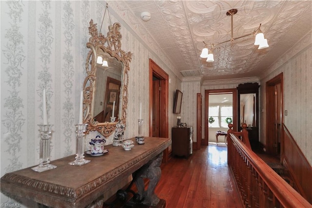 corridor featuring crown molding and dark hardwood / wood-style floors