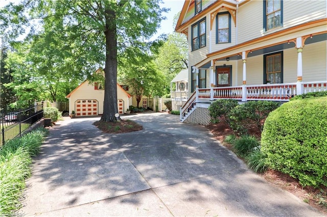 view of property exterior with a porch