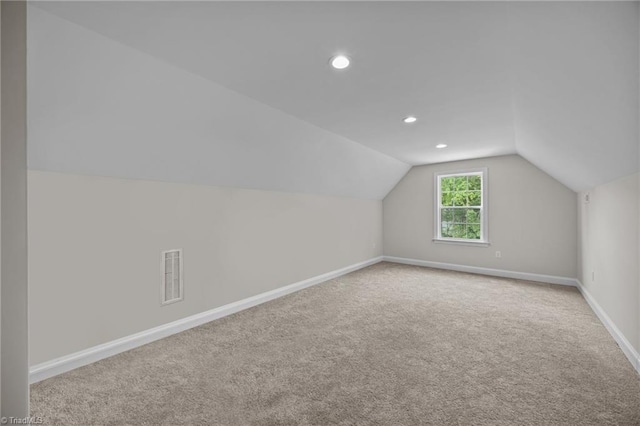 4944 Little Store Rd, Mcleansville, NC 27301 - bonus room featuring vaulted ceiling, carpet floors, baseboards, and recessed lighting