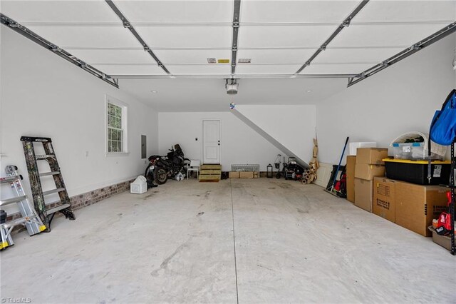4944 Little Store Rd, Mcleansville, NC 27301 - garage with a garage door opener