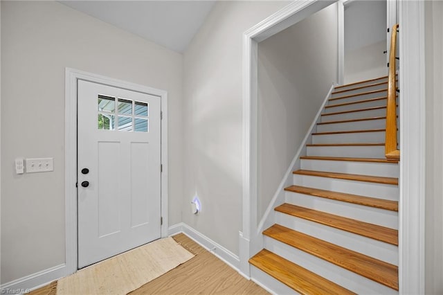 4944 Little Store Rd, Mcleansville, NC 27301 - entryway featuring baseboards, wood finished floors, and stairway