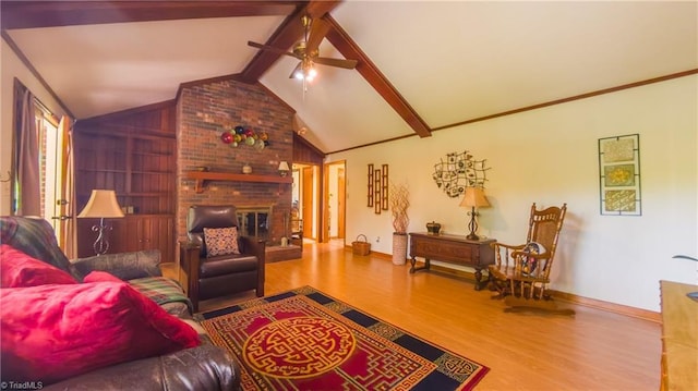 living room with wood finished floors, baseboards, and ceiling fan
