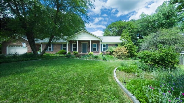 single story home featuring a front yard and brick siding