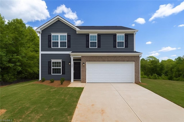 4192 Emmas Way E, Bend, NC 27018 - traditional home with a garage, driveway, a front yard, and brick siding