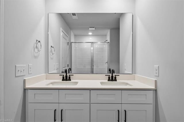 4192 Emmas Way E, Bend, NC 27018 - full bathroom with double vanity and a stall shower