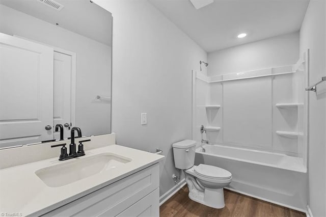 4192 Emmas Way E, Bend, NC 27018 - bathroom with toilet, wood finished floors, vanity,  shower combination, and baseboards