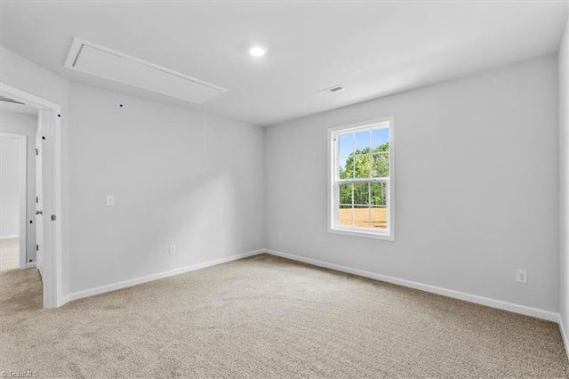 4192 Emmas Way E, Bend, NC 27018 - empty room featuring attic access, carpet floors, baseboards, and recessed lighting