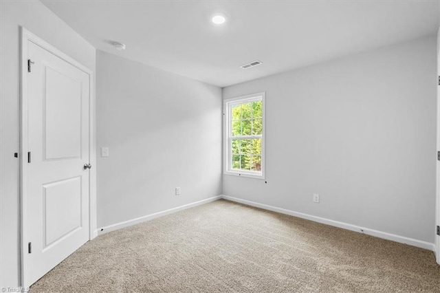 4192 Emmas Way E, Bend, NC 27018 - carpeted spare room with baseboards