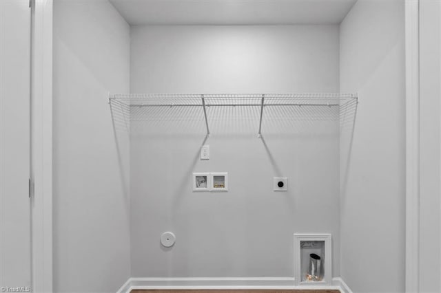 4192 Emmas Way E, Bend, NC 27018 - washroom featuring hookup for a gas dryer, hookup for a washing machine, hookup for an electric dryer, and baseboards