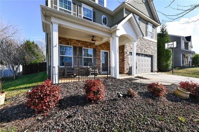 view of front of house featuring a porch and a garage