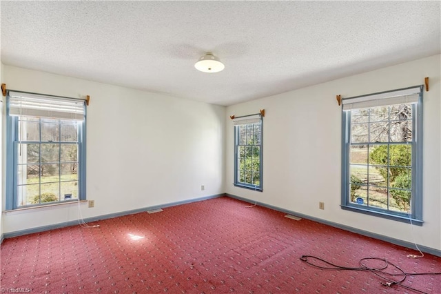 401 Joyce Rd, Hillsborough, NC 27278 - carpeted empty room featuring baseboards, a textured ceiling, and visible vents