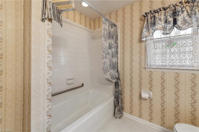 401 Joyce Rd, Hillsborough, NC 27278 - bathroom with tile patterned flooring, shower / bathtub combination with curtain, toilet, baseboards, and wallpapered walls
