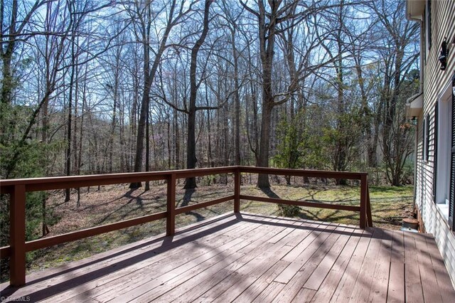 401 Joyce Rd, Hillsborough, NC 27278 - wooden terrace featuring a view of trees