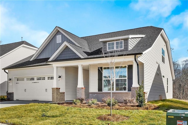 1085 Fairhaven Dr Lot # 49, Mebane, NC 27302 - craftsman-style house with an attached garage, a porch, a front yard, and board and batten siding