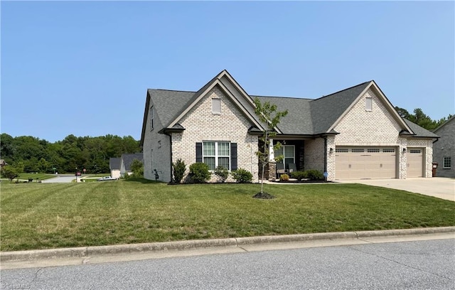 2834 Fallin Ct, High Point, NC 27262 - view of front of house featuring a garage, a front yard, concrete driveway, and brick siding