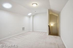 2834 Fallin Ct, High Point, NC 27262 - additional living space featuring lofted ceiling and carpet floors