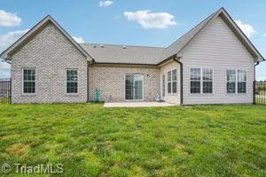 2834 Fallin Ct, High Point, NC 27262 - rear view of house featuring a patio and a fenced backyard