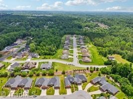 2834 Fallin Ct, High Point, NC 27262 - aerial view of property's location with nearby suburban area and a forest