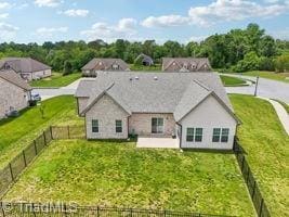 2834 Fallin Ct, High Point, NC 27262 - back of house featuring a fenced backyard and a patio