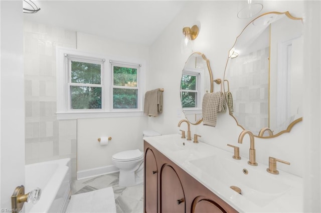 bathroom with toilet, a tub, baseboards, double vanity, and a shower
