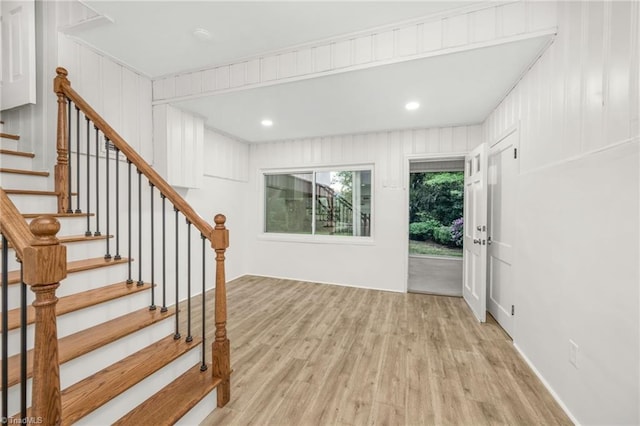 interior space featuring light wood-style flooring and stairway