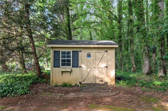 211 Forestview Dr, Elon, NC 27244 - view of shed with a forest view