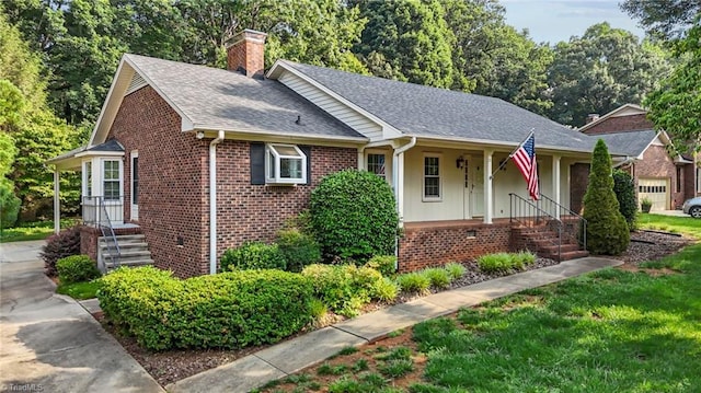 211 Forestview Dr, Elon, NC 27244 - view of front of home featuring brick siding, a chimney, a shingled roof, and a porch