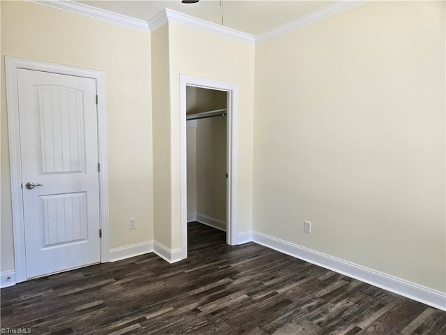 unfurnished bedroom featuring dark wood-type flooring and ornamental molding