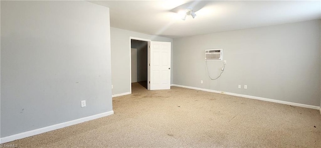 interior space with a wall mounted air conditioner and carpet floors