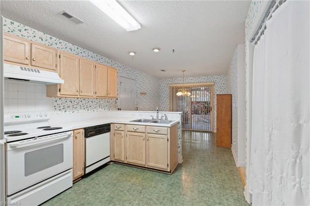 kitchen featuring kitchen peninsula, white appliances, sink, pendant lighting, and light brown cabinets