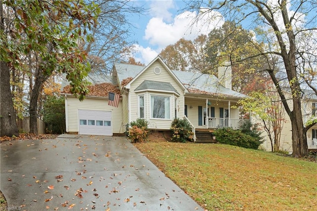 bungalow-style home with a porch, a garage, and a front lawn