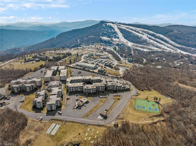 drone / aerial view featuring a mountain view