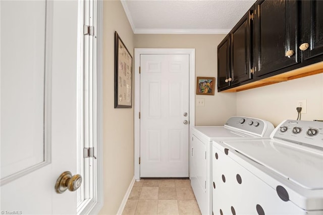 clothes washing area featuring washer and dryer, cabinets, light tile patterned floors, crown molding, and a textured ceiling