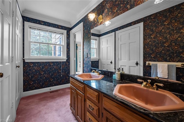 12088 Burlington Rd, Hurdle Mills, NC 27541 - bathroom featuring wallpapered walls, double vanity, crown molding, and baseboards