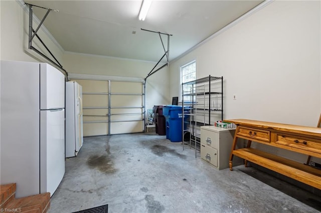 12088 Burlington Rd, Hurdle Mills, NC 27541 - garage featuring freestanding refrigerator and white fridge with ice dispenser